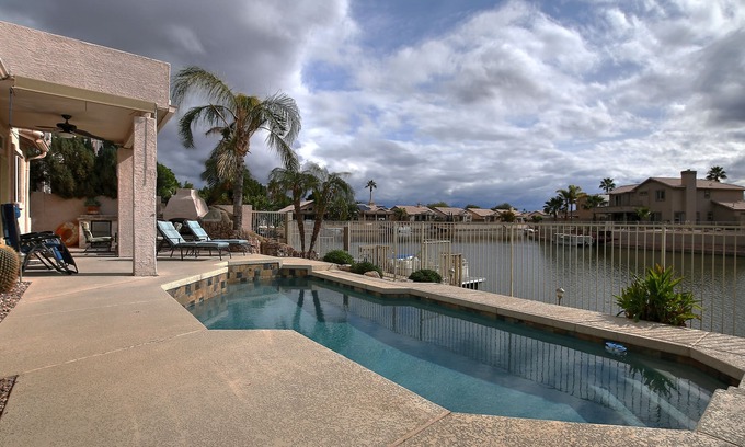 Arrowhead Lakes House | Lakefront Luxury Home with a Heated Pool, close to Peoria Sports Complex