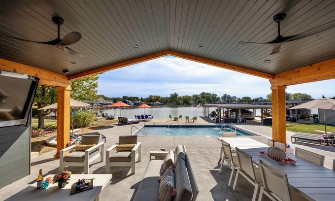 Lakeview House | Lakefront Luxury: Sunrise Views, Pool, Dock & Walk to Dining!