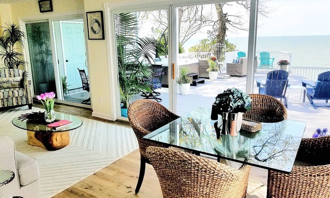 Mentor-on-the-Lake House | Lakefront Oasis Retreat Private Beach-Hot Tub-Pet Friendly-3 Bd/2 B-King Suite