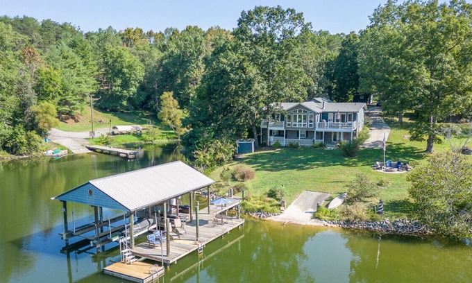 Goodview House | Lakefront Retreat w/ Game Room, Hot Tub, and Gym!