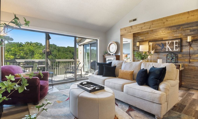 Osage Beach Condo | Lakefront Stargazer - Fireplace - Desk - King & Queen Beds - Stunning Views