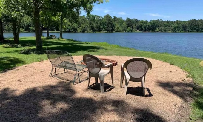 Montgomery House | Lakehouse on a small private lake situated on 1.2 acres of lakefront property.