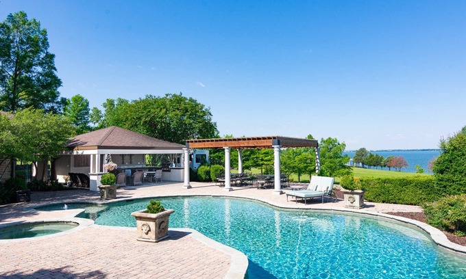Heath Condo | Lakeside Getaway: Pool, Sauna, 2BR Over Garage Condo and RV, Fishing, Playground, Basketball Court!