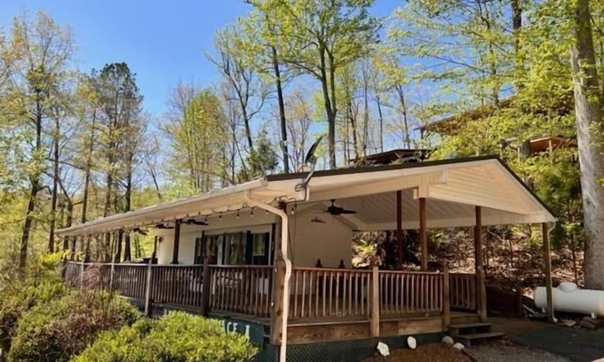 Eddyville Cabin | Lakeside Place 1 (Sleeps 1-6) - Tiny living space with a queen bed, and 3 twin beds perfect for kids