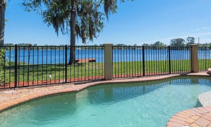 Interlachen House | Lakeside Retreat~ Large home with pool, dock, game room and balcony on lakefront
