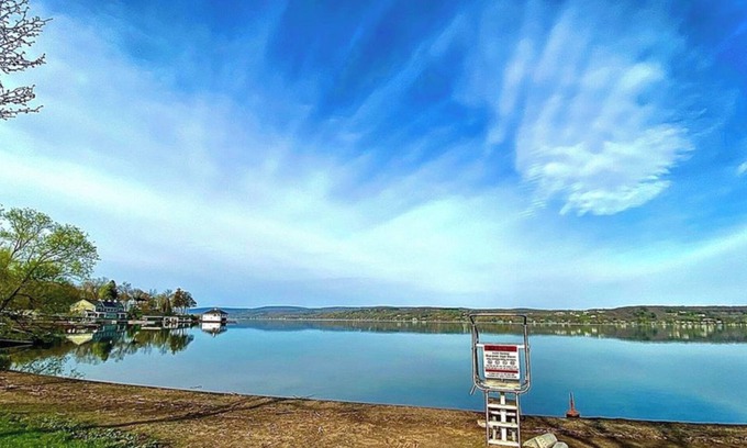 Canandaigua Cottage | Lakeview retreat with beach access. Stylish home just steps from Deep Run Beach.