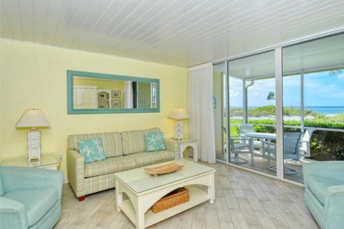 Longboat Key Apartment | LaPlaya 105B-Relax on the balcony and watch the dolphins swim by and the pelicans dive!