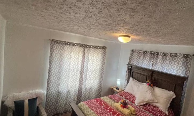 Columbus House | Large and neatly arranged house with a large parking lot .