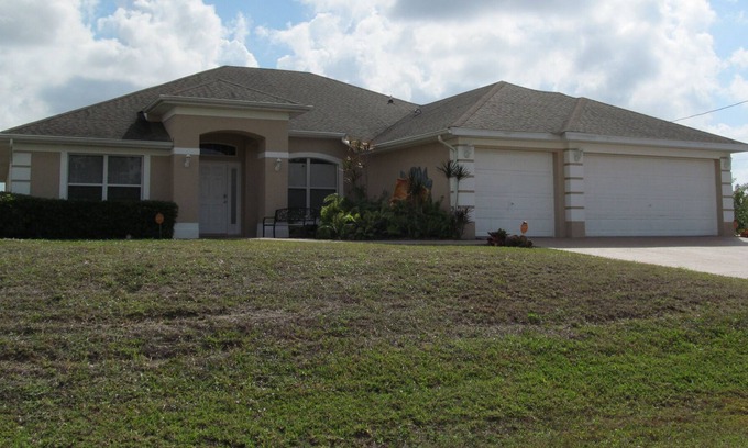 Lehigh Acres House | Large & Beautiful 4 Bdrm Home with Heated Pool & Screened Lanai near Fort Myers