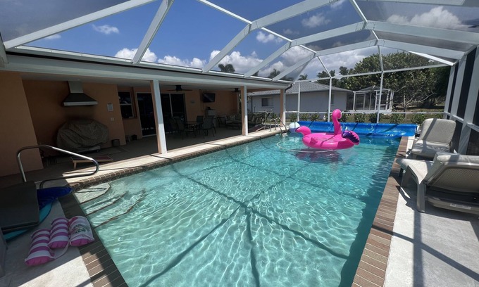 Cypress Lake House | Large family home with heated pool
