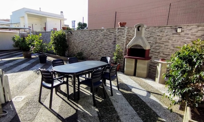 Lizzano Apartment | Large two-room apartment with garden and barbecue 7km from the sea
