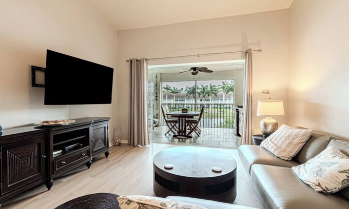 Naples Condo | Large updated lanai overlooking the heart of the water at Magnolia Falls.