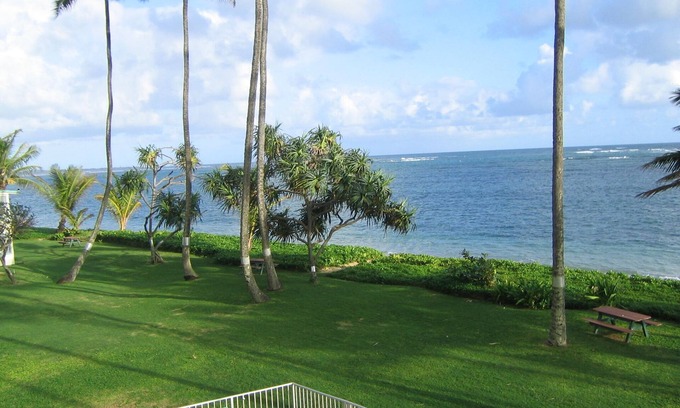 Punaluu Condo | Largest Private Patio on the Ocean and Air-Conditioning