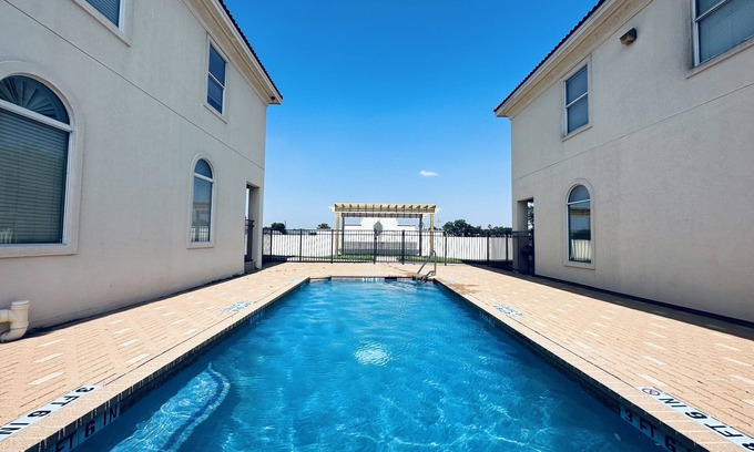 McAllen Condo | Las Jollas Luxurious Condo w/Pool & Garage, Very Close to Shopping and Airport
