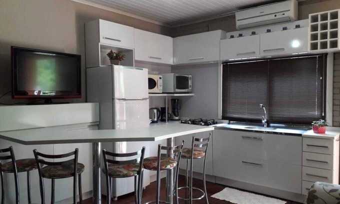 Floresta Apartment | Lawn Center Accommodation