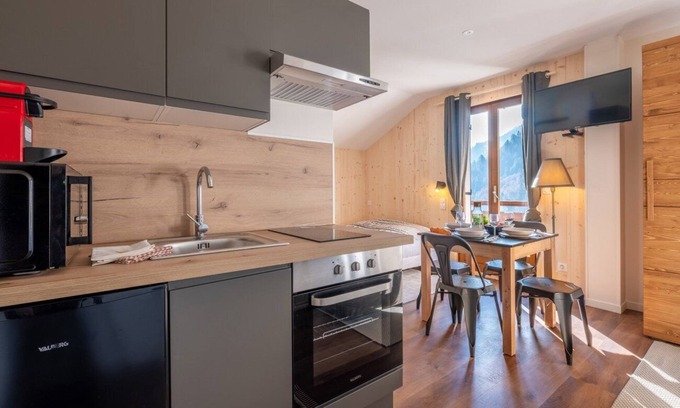 La Giettaz Apartment | Le Petit Aravis - panoramic balcony and village