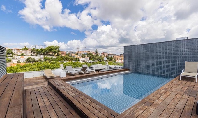 Sao Jose Apartment | Liberdade Elegance W/Rooftop Pool by LovelyStay