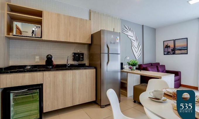 Caminho das Arvores Apartment | Linda Suíte com cozinha compacta em região central