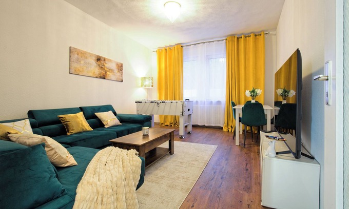 Fulda Apartment | Living La Christal apartment with workspace & games