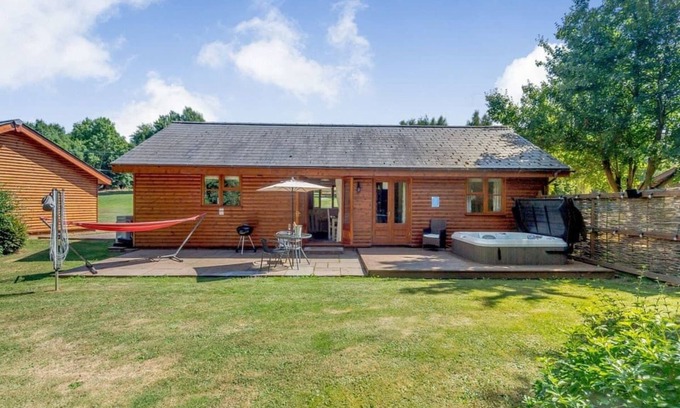 Kilcot Ski Chalet | Lodge with one king-size double with en suite shower.