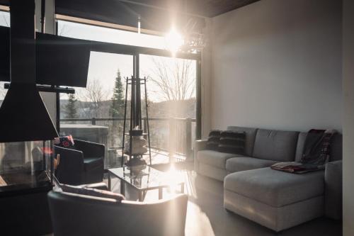 Saint-Faustin-Lac-Carre Apartment | Loft Exécutif CherLieu de luxe avec vue sur golf et montagnes
