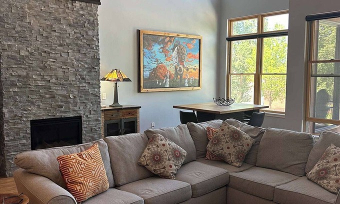 Salida Condo | Lofted condo on the boat ramp, downtown Salida, king bed plus super comfortable queen murphy bed and sleeper sofa. Two levels, two bathrooms, parking spot in garage included.