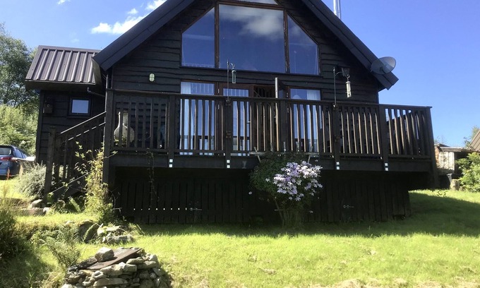 Dallavich Cabin | LOG CABIN Master Galleried Bedroom 2 Bathrooms Wood Burner Loch & Mountain Views