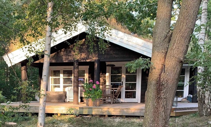 Nykobing Sjaelland House | Log house near a child-friendly sandy beach
