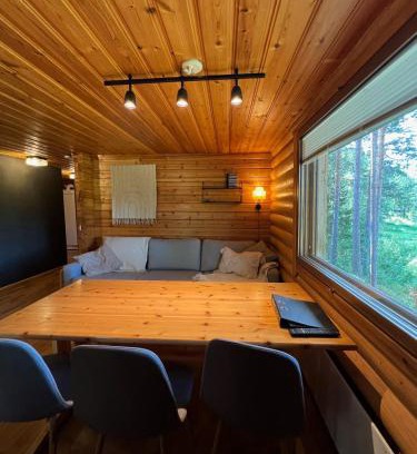 Yllasjarvi House | Logcabin, sauna, fireplace, view, kitchen