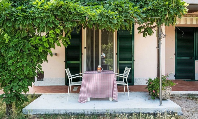 San Feliciano Apartment | Lovely apartment for 4 guests with WIFI, pool, A/C, TV, patio, pets allowed and parking