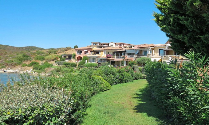 Baia Caddinas Apartment | Lovely apartment for 6 guests with A/C, pool, WIFI, TV, terrace, pets allowed and parking