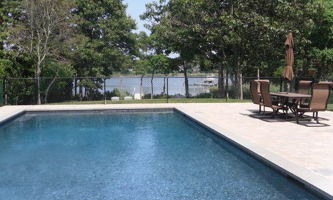 Menantic Creek House | Lovely home by the sea with dock and heated Gunite pool!