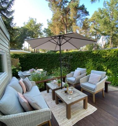 Bosgebied Hoenderloo Ski Chalet | Luxe Chalet met prachtig terras op de Veluwe , veel privacy
