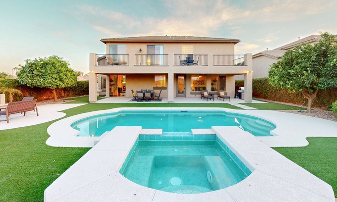Seville House | Luxe snowbird-friendly haven with heated pool, gas fireplace, balcony, & firepit