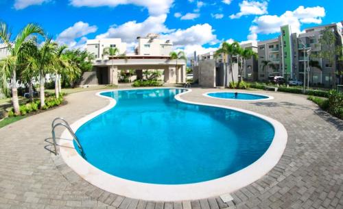 Llanos de Gurabo I Apartment | Luxurious 3-Bedroom Apartment with Pool & 24/7 security