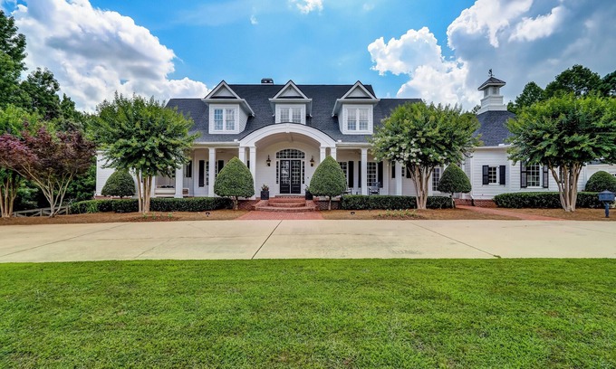 Dacula House | Luxurious 13,000 sq. ft. home: 7 private king suites, bunk room & movie theater