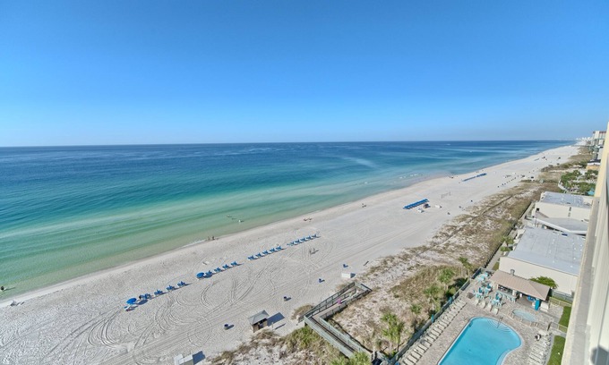 Thomas Drive Condo | Luxurious Beachfront Condo with Beachside Pool Access and Free WiFi - Unit 1202 by RedAwning