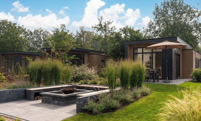 Lieren House | Luxurious Cannenburch Deluxe, atmospheric outdoor area and lounge with outdoor fireplace.