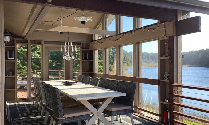 Langlois House | Luxurious Getaway on the Lake with hot tub, pool table, boat dock, covered porch