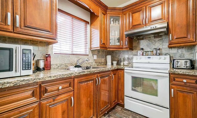 Newton Apartment | Luxurious Master Bedroom Suite with In-suite Bathroom with Jacuzzi