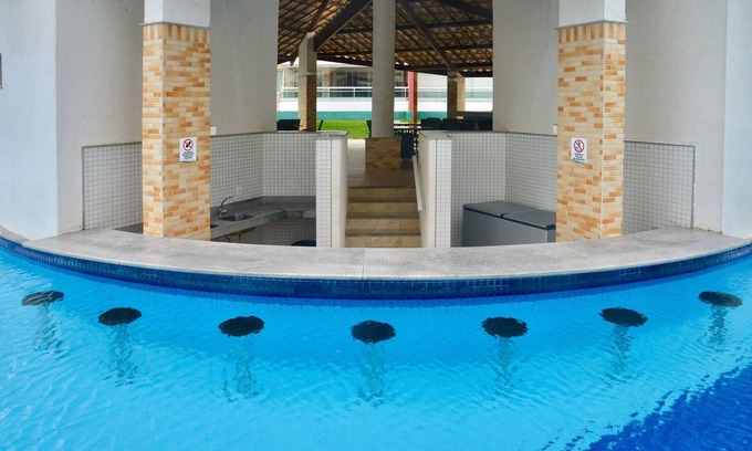 Porto das Dunas Condo | Luxurious penthouse with 2 suites, living room, balcony, jacuzzi and barbecue