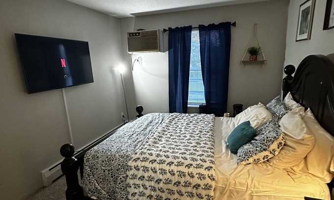 West Bloomington Condo | luxurious retreat w top-notch features, AC, play area, game fun, gym & patio