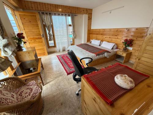Naggar Apartment | Luxury 1 BHK Apartment for Rent in Naggar,Manali with Modern Kitchen, Wooden Interior, and Spacious Bathroom