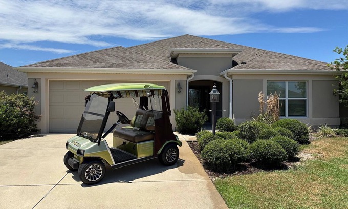 Fernandina House | Luxury 2 bed/2 bath designer home near Brownwood 2 person gas cart