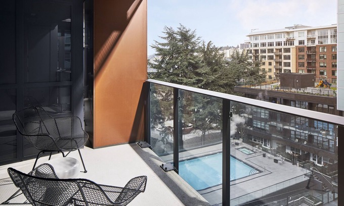 South Lake Union Hotel | Luxury 2-BR Suite in South Lake Union: Pools, Gym, Kitchen, & Balcony