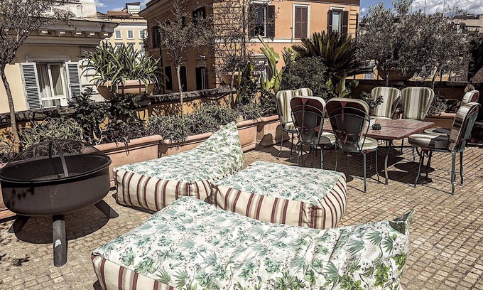 Monti Apartment | Luxury atelier house with terrace over FoRI/Colosseum with Dyson air system