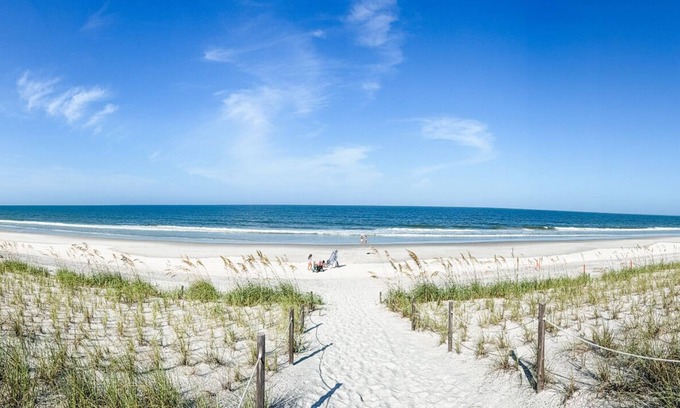 Vilano Beach House | Luxury beach escape, 2 blocks to the ocean & 1 block to the river! Enjoy a heated pool, hot tub, paddle boards, kayaks, golf cart & more—only 10 mins to downtown St. Augustine. Very clean, well stocked & perfect for couples, families & small groups.