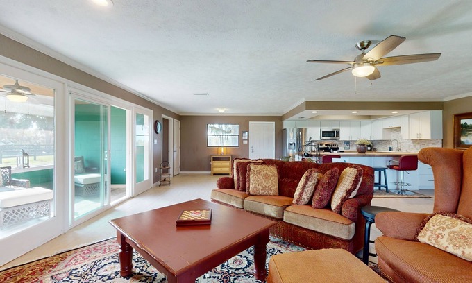 Micanopy House | Luxury duplex with private screened porch and lake view
