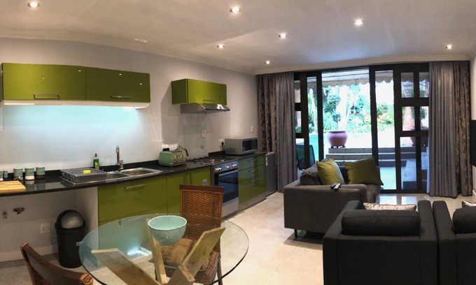 Bedfordview Apartment | Luxury Executive Apartment Overlooking Beautiful Pool & Garden