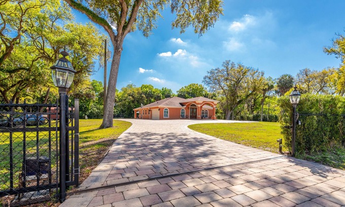 Town N County Park House | Luxury Gated Home with Mini Golf